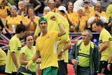 Australia's Thanasi Kokkinakis celebrates a win over Czech Republic's Lukas Rosol in Davis Cup.