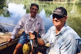 Fish reserchers David Crook and Tim Berra at Yellow Water, Kakadu National Park