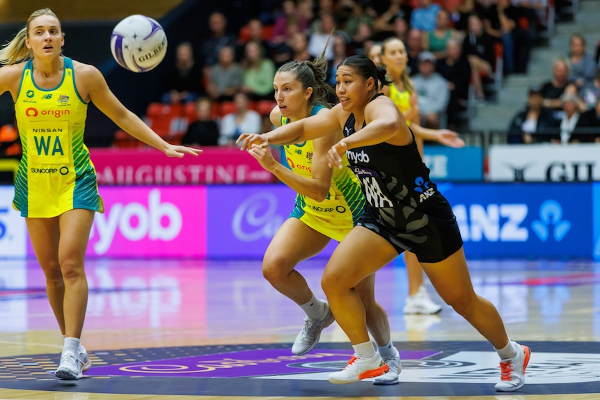 Peta Toeava and Amy Parmenter contest for the ball