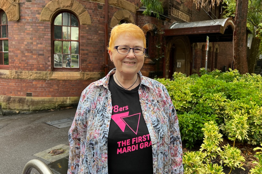 a woman looking at the camera and smiling