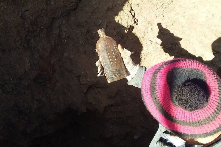 An old bottle found by Brian Edwards at the old dump in Broken Hill's north.