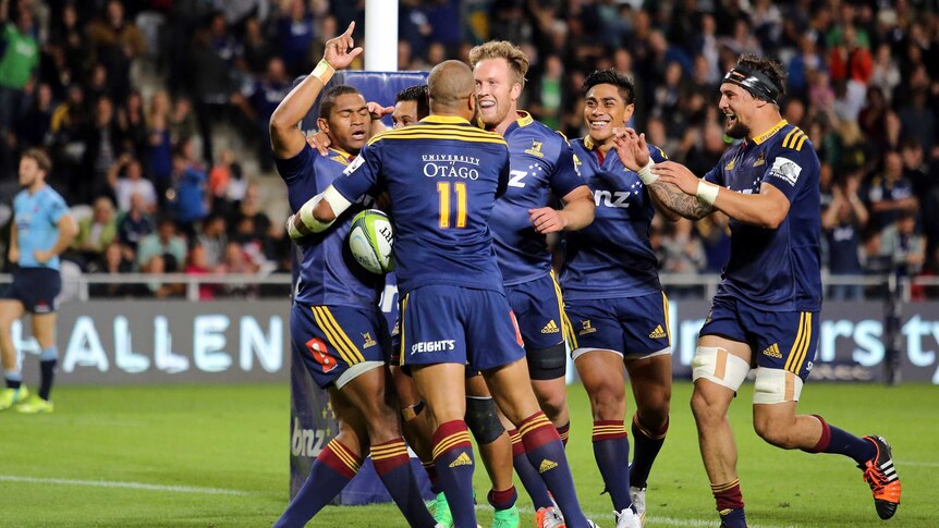 Waisake Naholo of the Highlanders celebrates his try