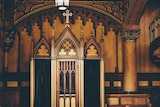 A wooden confessional