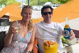 David Pell and his wife enjoy a bucket of prawns at Port Douglas, for a story on domestic travel insurance.