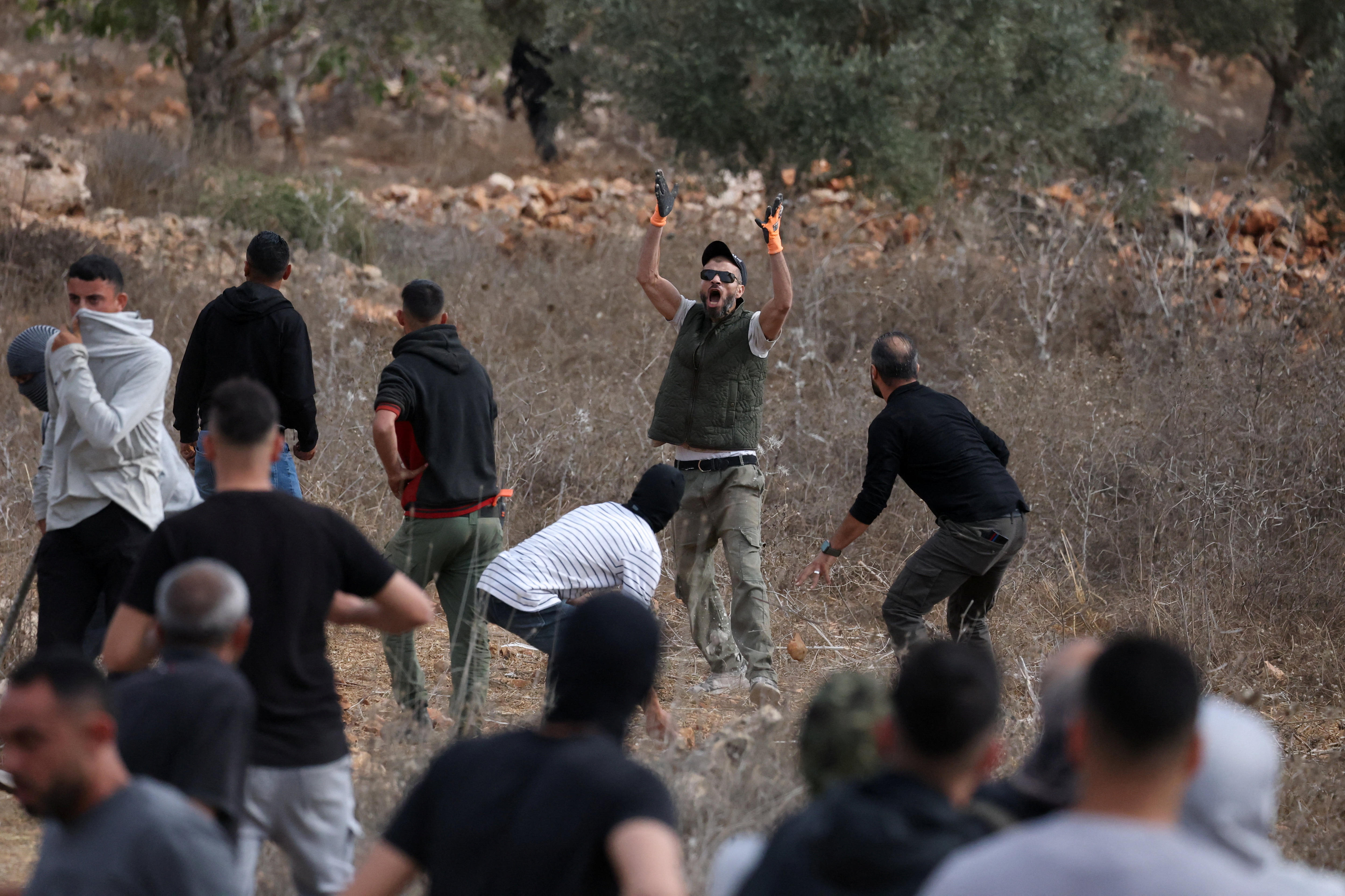 Violent clashes involving slingshots during West Bank olive harvest