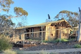 A house ready to be demolished in Leigh Creek with only its frame left 