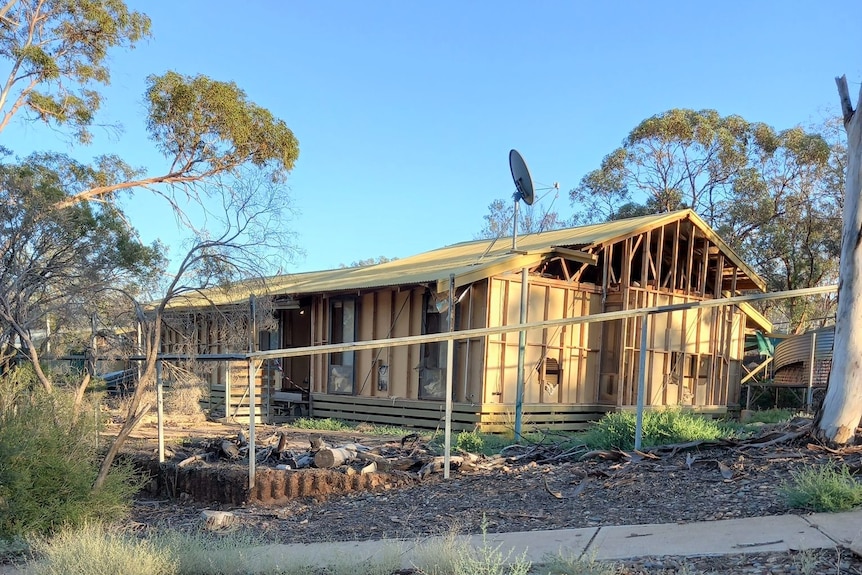 A house ready to be demolished in Leigh Creek with only its frame left 