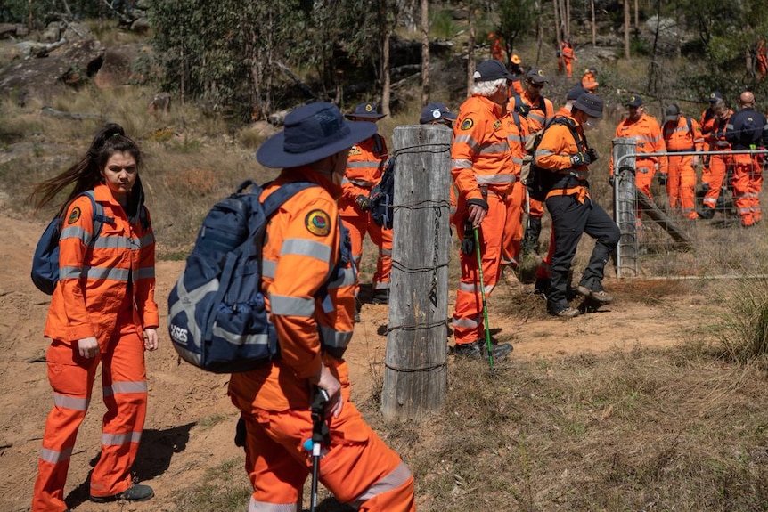 Rescue teams in orange clothing