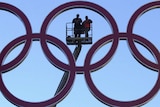 The Olympic rings being constructed on Sydney Harbour Bridge in August 2000.