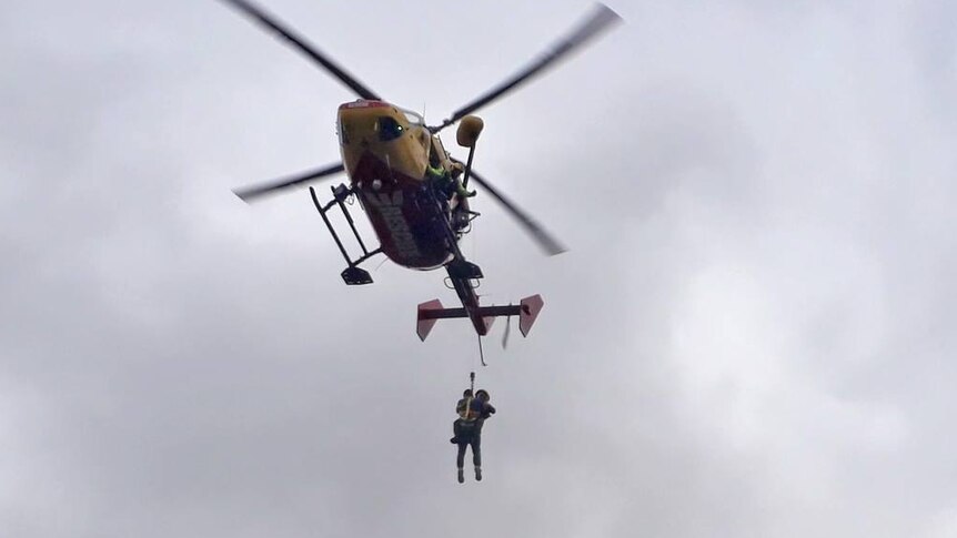 Boy winched to helicopter in Tasmania.