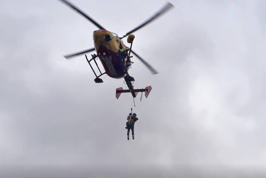 Boy winched to helicopter in Tasmania.