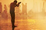 Sunrise prayers at Kumbh Mela, India
