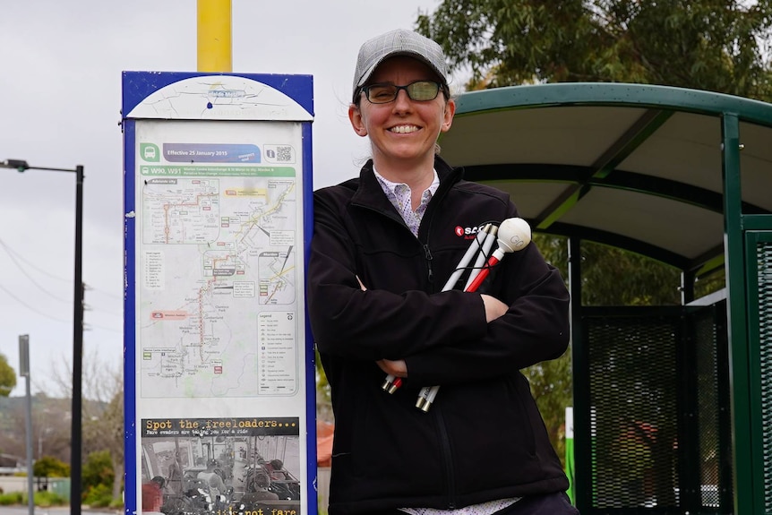Software programmer Cassie Hames at an Adelaide bus stop.