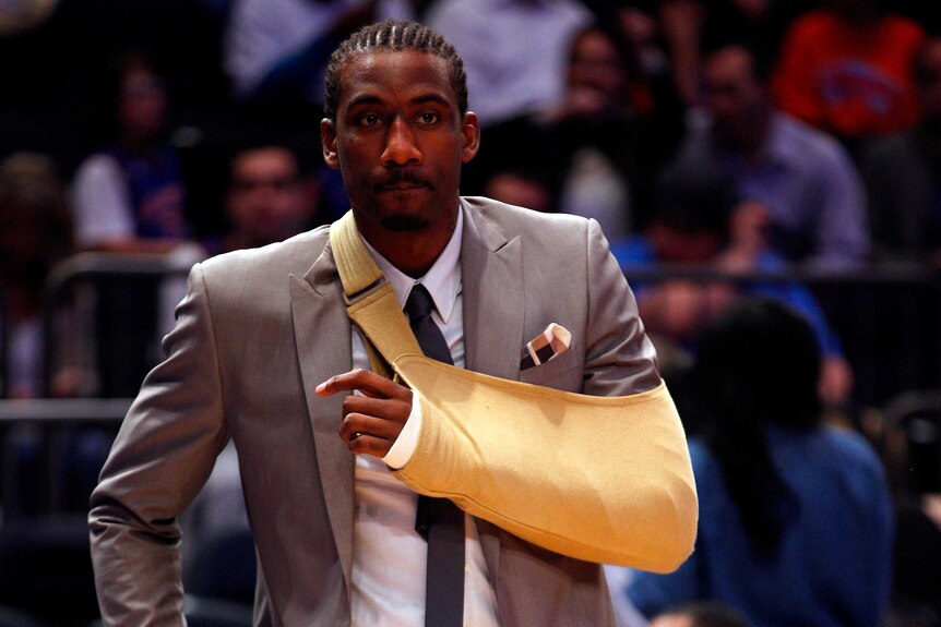 Amare Stoudemire with his arm in a sling