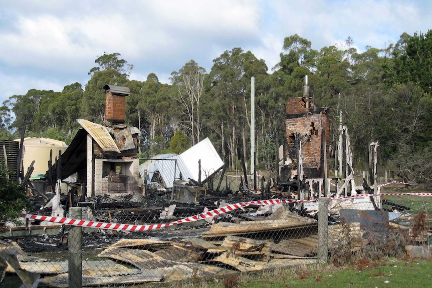 Burnt out house in Winkleigh, northern Tasmania, where a gun safe was found open in ruins.