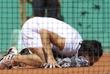 Francesca Schiavone bends to kiss the court after qualifying for the French Open final.