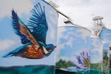 A painted kingfisher on a large grain silo