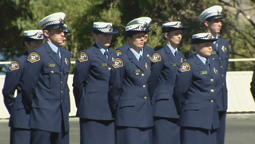 Some of the first police graduates in three years