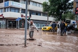 A man wades through the flooded streets of Copiapo in northern Chile