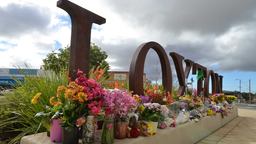 Flowers left at Loxton sign for Kirsty Boden.