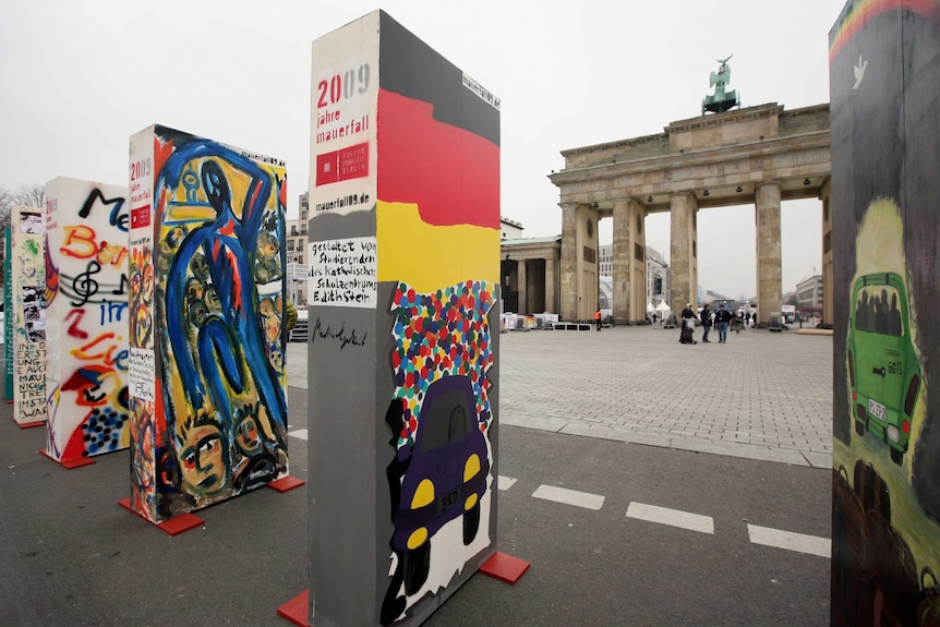 Berlin Styrofoam dominoes in a long row near the Brandenburg Gate