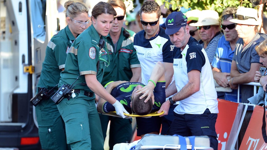 Giovanni Visconti is helped after breaking leg at the TDU
