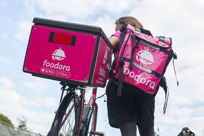 A Foodora delivery worker.