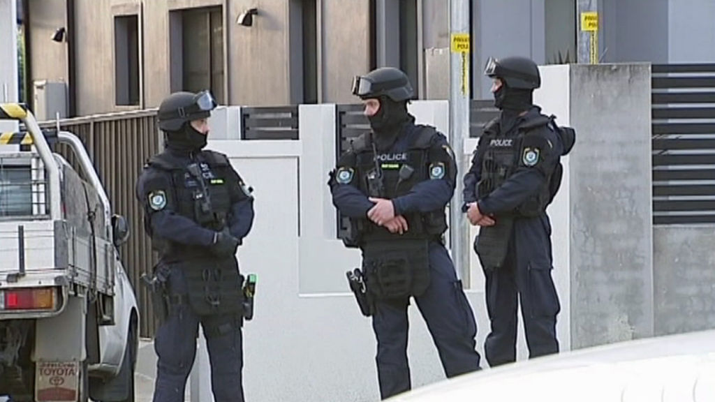 Five people arrested as police raid properties across western Sydney ...