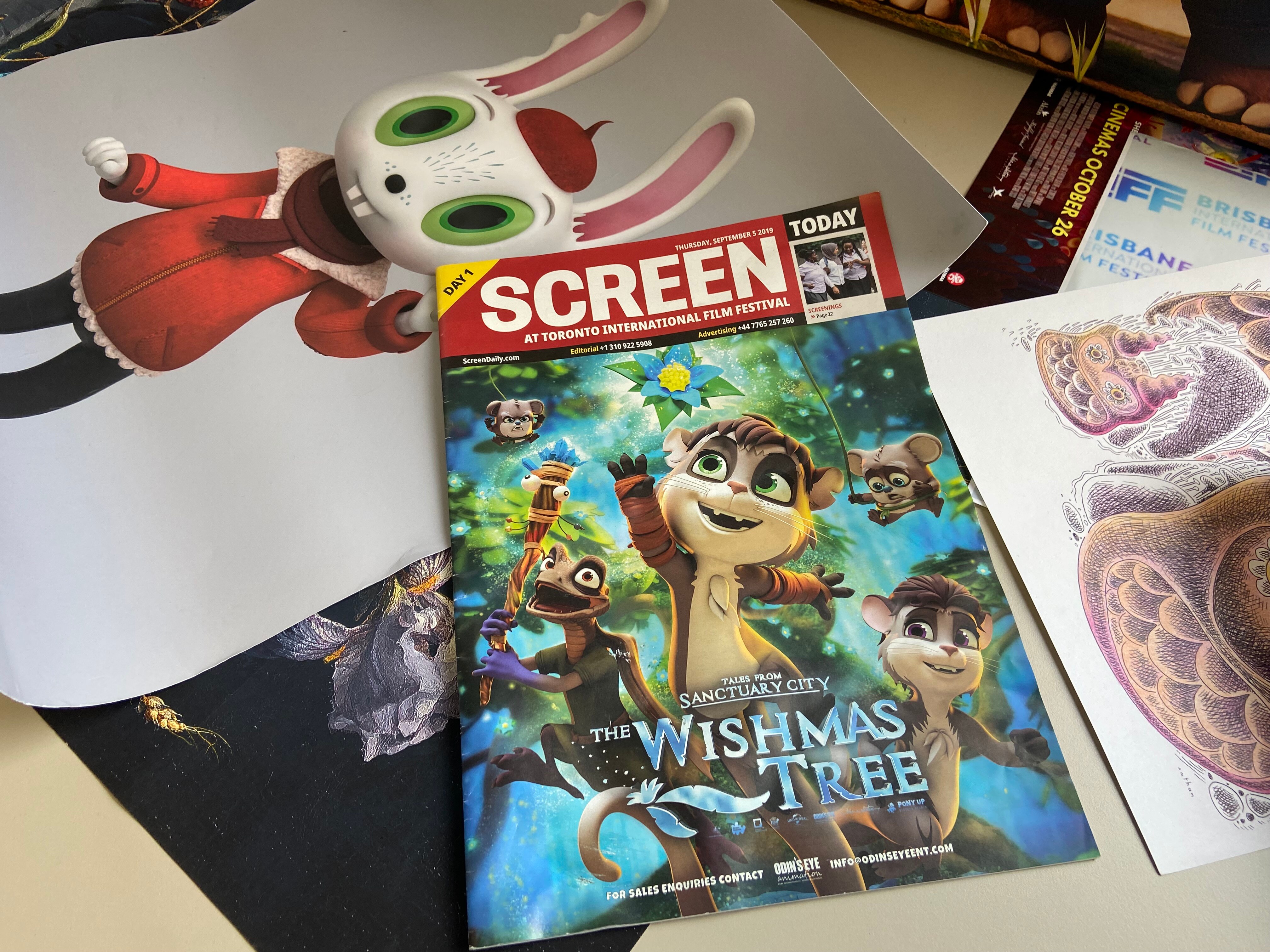 A film magazine with animated characters on the cover.