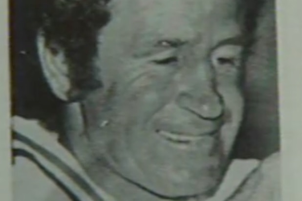 A black and white photograph of John Coogan from a school yearbook.