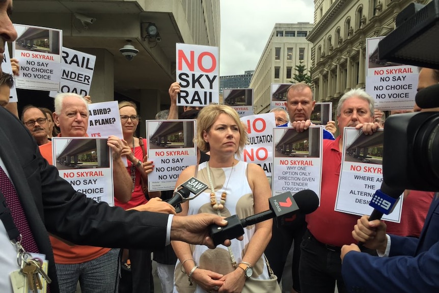 Protesters rally against nine-metre-high elevated rail track to be built along Melbourne's Cranbourne-Pakenham line.