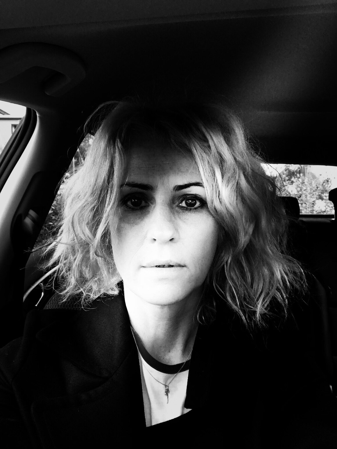 A black and white headshot of Alison Veness