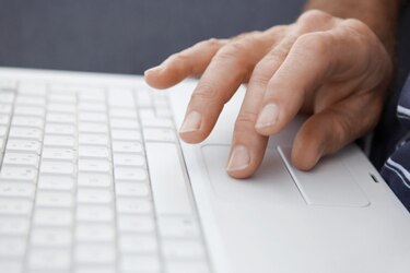 File photo: Close Up of a Hand Using a Laptop Computer  (Getty Creative Images)