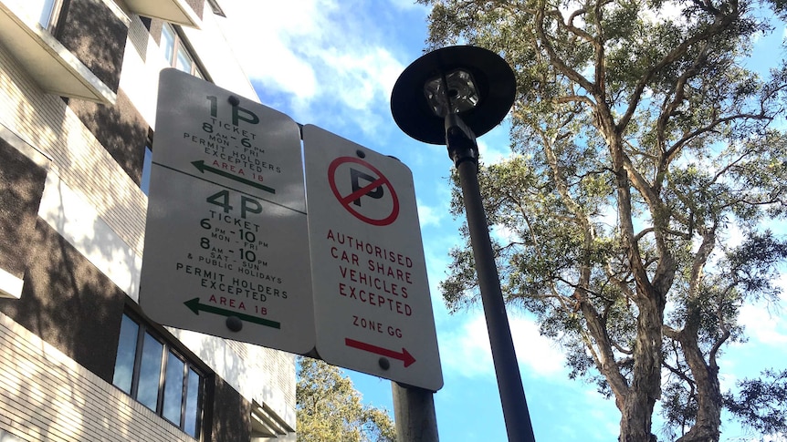 A sign showing authorised car share vehicles are allowed to park in a no-parking zone in Surry Hills, Sydney.