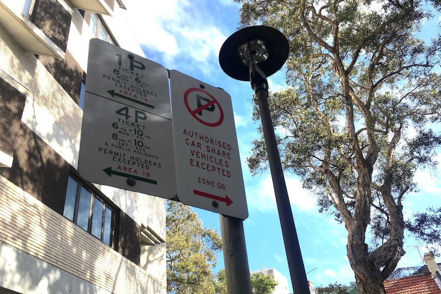 A sign showing authorised car share vehicles are allowed to park in a no-parking zone in Surry Hills, Sydney.
