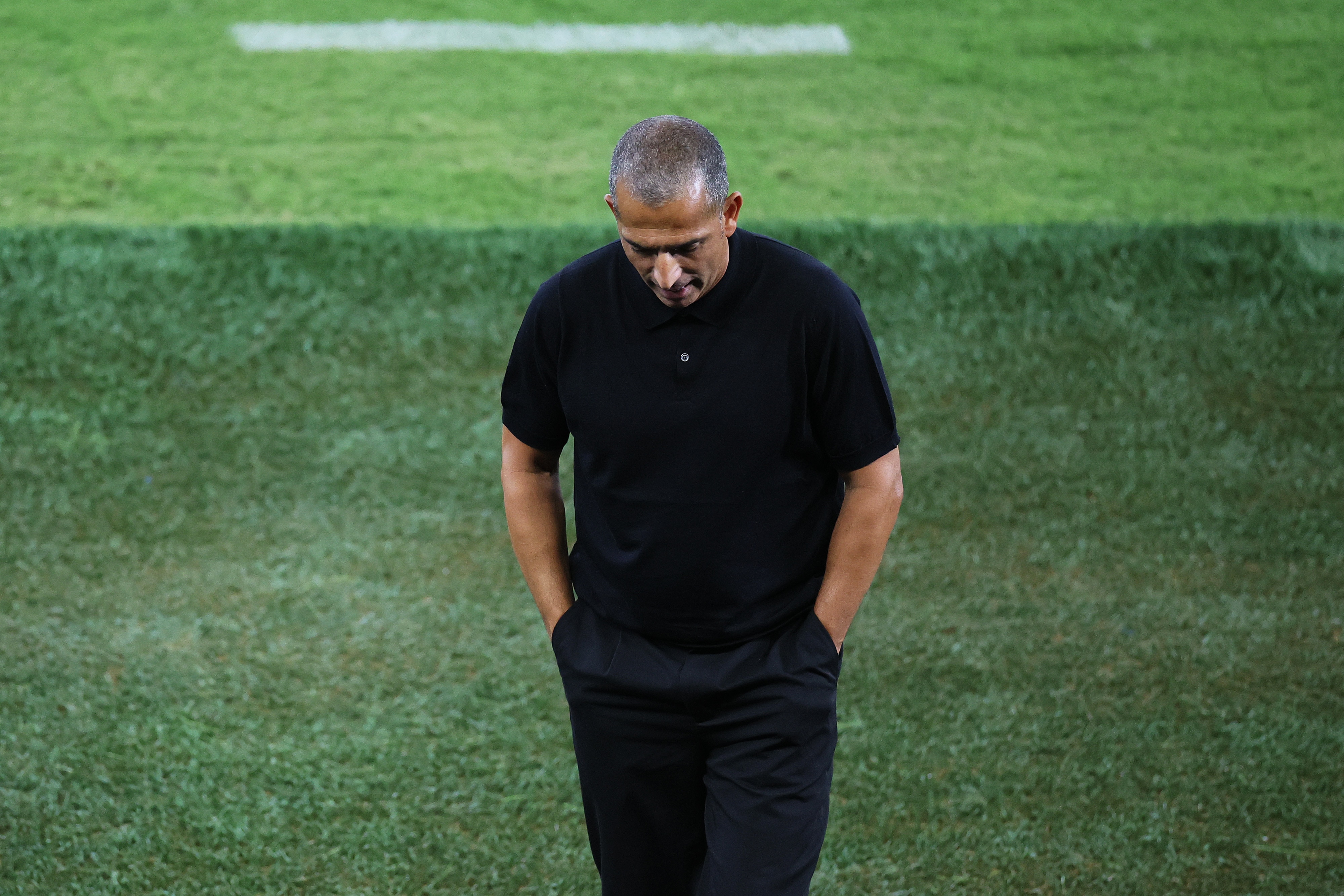 Sabri Lamouchi looks downtrodden on the touchline