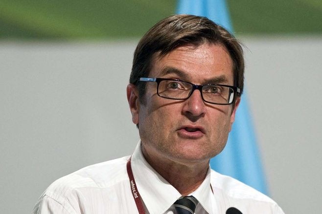 Climate Change Minister Greg Combet speaks at the United Nations Climate Change conference in Cancun (AFP: Ronaldo Schemidt)