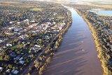The Balonne River starts to recede to its normal flow next to the town of St George