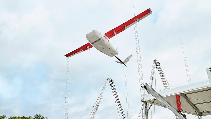 A small fixed-wing aircraft takes off. 