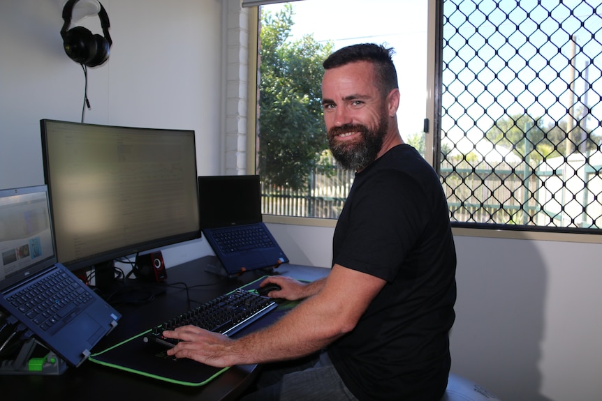 Joe Bridge at his computer.