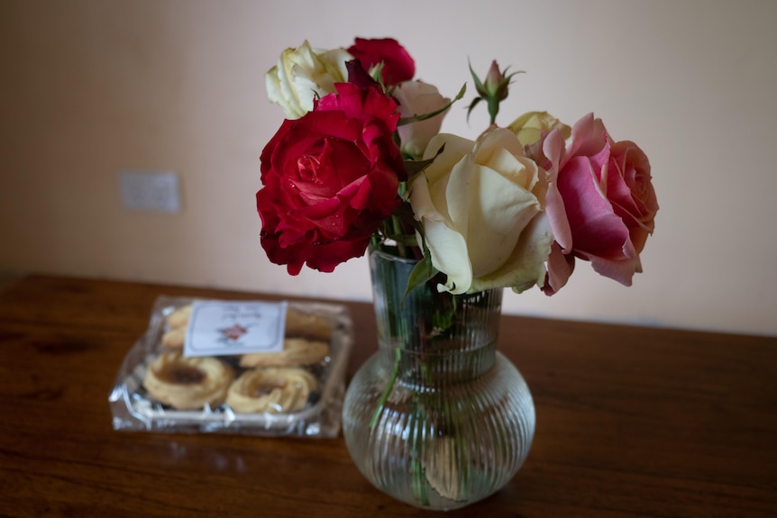Flowers and biscuits on a coffee table
