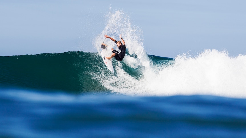 Mick Fanning surfs in California