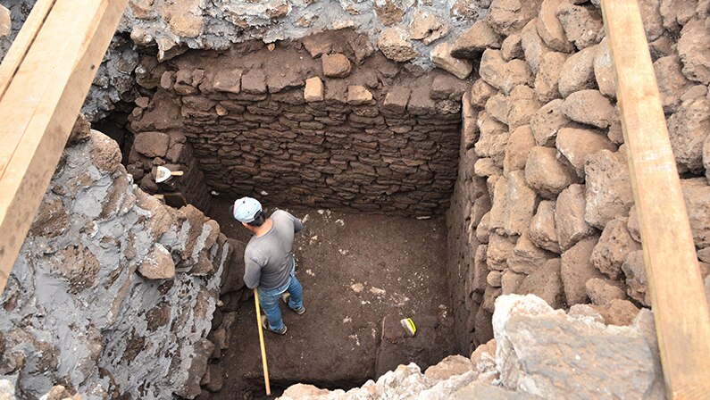 Archaeologist inspects temple site in Mexico