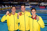 Australians James Magnussen, Cameron McEvoy (R) and Tommaso D'Orsogna (L) with their medals after the 100m freestyle in Glasgow