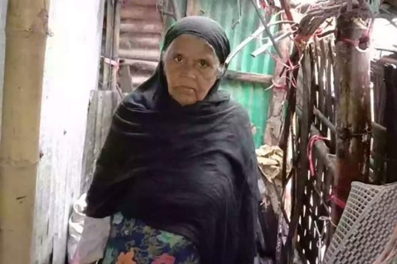 Nurul Mustafa’s grandmother Mojuna Khatun look solemn in her home at a refugee camp in Bangladesh