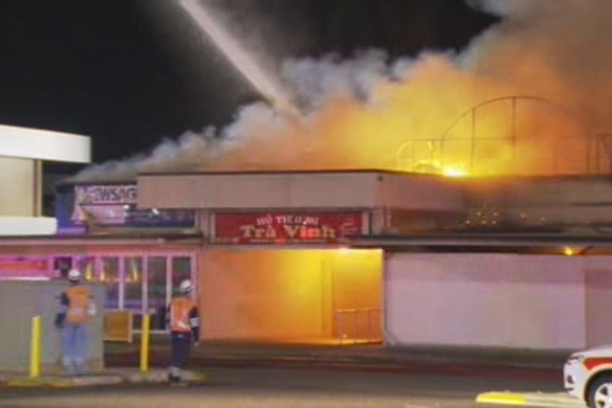 A large building within the Inala shopping complex was well alight when fire crews arrived at the scene at 1:30am