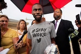 Black Lives Matter activist DeRay Mckesson talks to the media after his release from the Baton Rouge jail.
