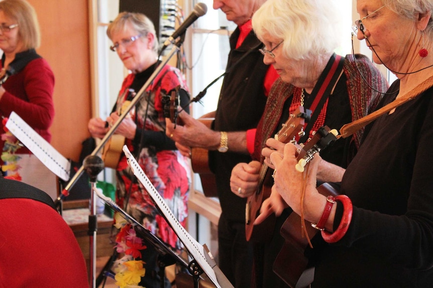 The 'Miss Spent Ukes' performing in Hobart.