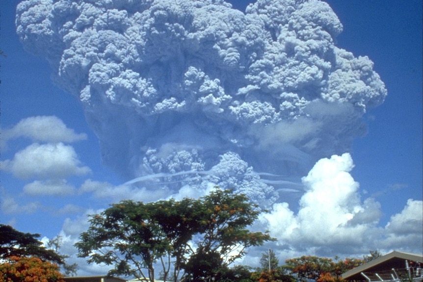 A giant column of smoke and ash erupting from Mount Pinatubo in the Philippines