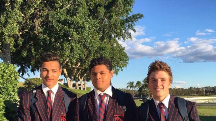 Jordan Petaia (left) in Brisbane State High School uniform, with two friends.